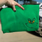 Grinch Face Embroidered Pocket Crewneck Sweatshirt